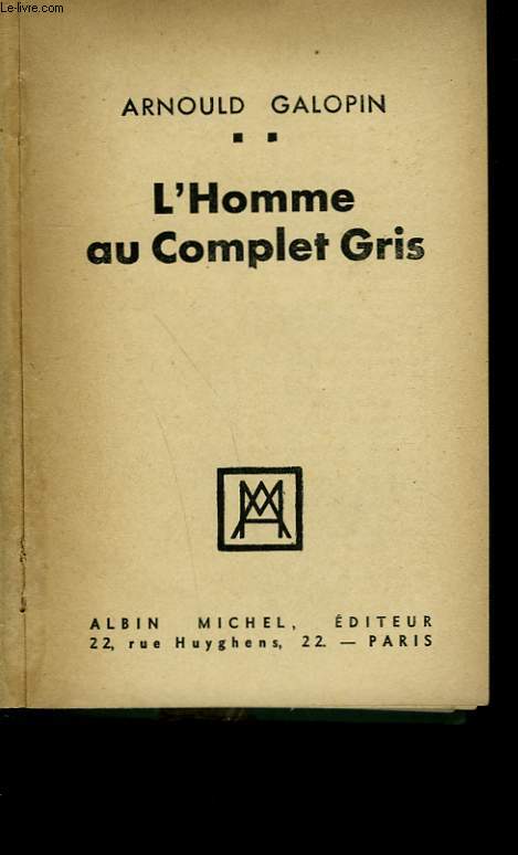 L'HOMME AU COMPLET GRIS.