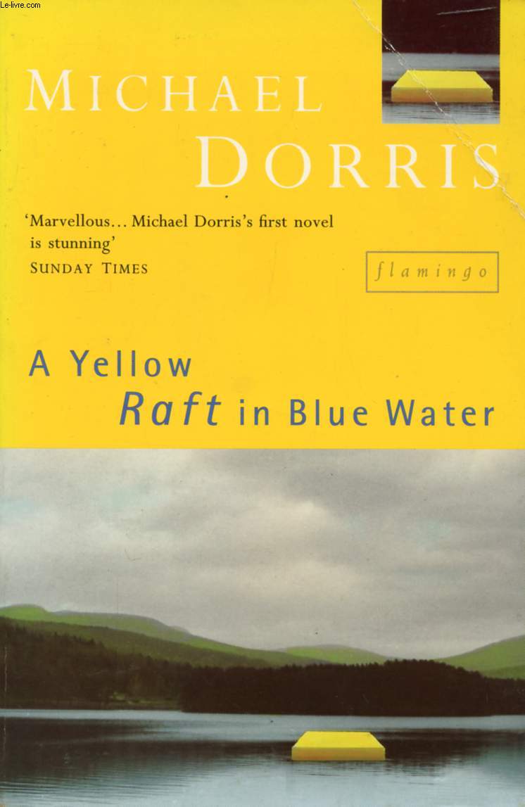 A YELLOW RAFT IN BLUE WATER