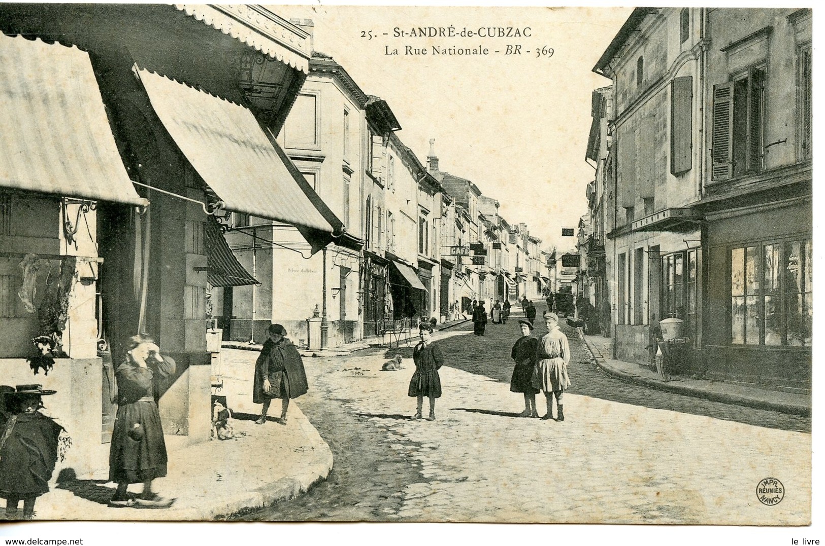 CPA 33 ST-ANDRE-DE-CUBZAC. LA RUE NATIONALE