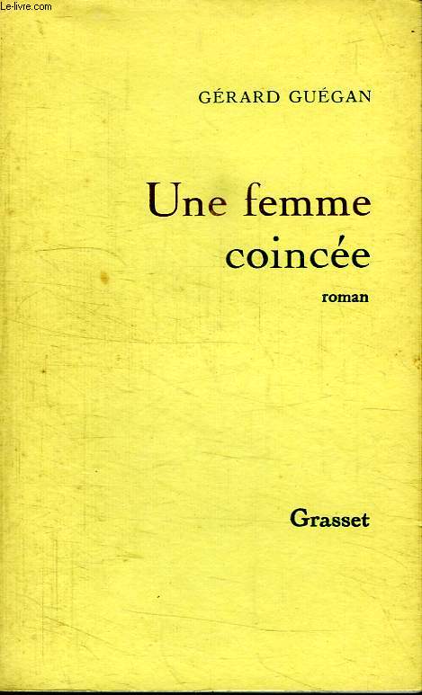 UNE FEMME COINCEE.