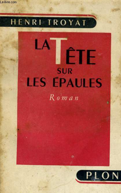 LA TETE SUR LES EPAULES