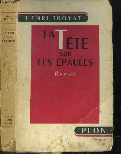 LA TETE SUR LES EPAULES