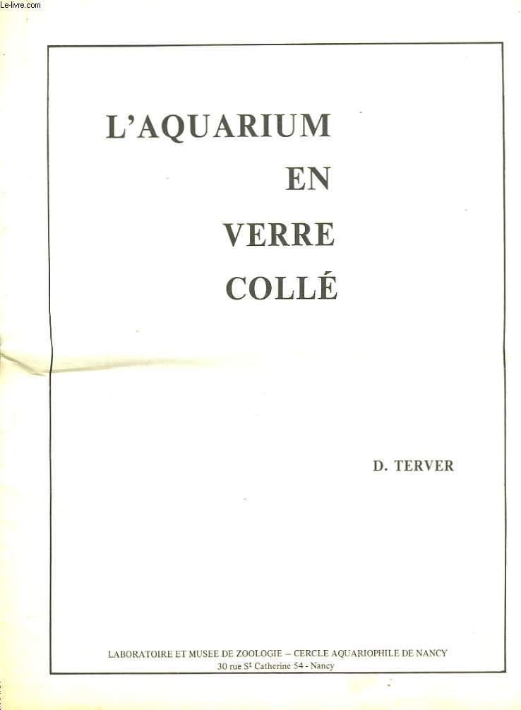 L'AQUARIUM EN VERRE COLLE.