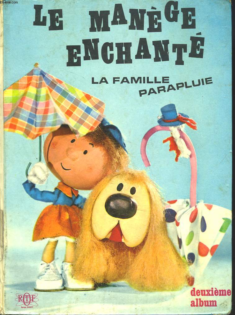 LE MANEGE ENCHANTE. LA FAMILLE PARAPLUIE