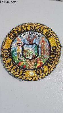 UN BADGE GREAT SEAL OF THE STATE OF IDAHO.