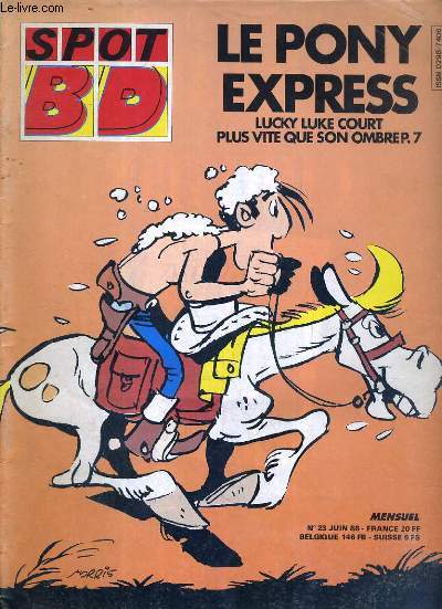 SPOT BD - N23 - JUIN 1988 - lucky luke: le pony express - barcelone, madrid, paris: route de l'aventure - cet hiver-la.. - rock around la B.D. - un ton au-dessus...