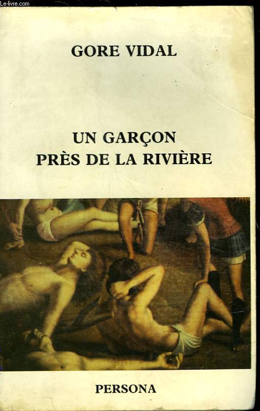 UN GARCON PRES DE LA RIVIERE