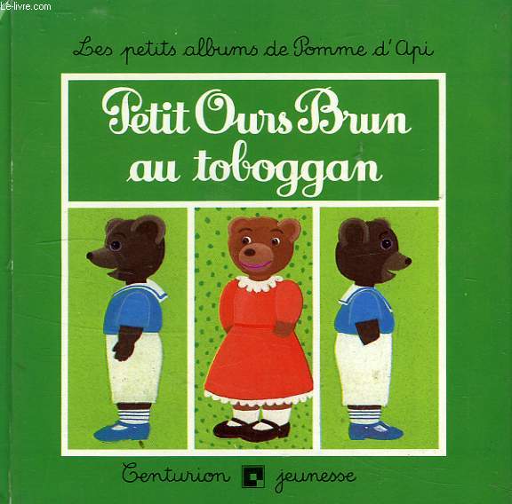 PETIT OURS BRUN AU TOBOGGAN