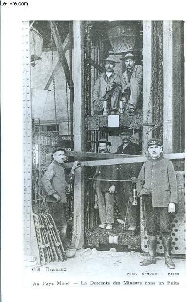 Photographie, en noir et blanc, de la Descente des Mineurs dans un Puits. Au Pays Miner.